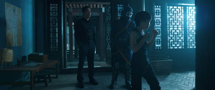 (L-R): Wenwu (Tony Leung), Death Dealer and Young Shang-Chi (Jayden Tianyi Zhang) in Marvel Studios' SHANG-CHI AND THE LEGEND OF THE TEN RINGS. Photo courtesy of Marvel Studios. ©Marvel Studios 2021. All Rights Reserved.