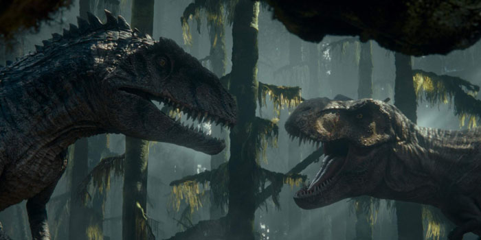 (from left) A Giganotosaurus and T. Rex in Jurassic World Dominion, co-written and directed by Colin Trevorrow.
