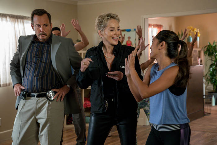 Murderville. (L to R) Will Arnett as Terry Seattle, Sharon Stone as Guest 102, Samantha Cutaran as Dr. Madison Chen in episode 102 of Murderville. Cr. Lara Solanki/Netflix © 2021