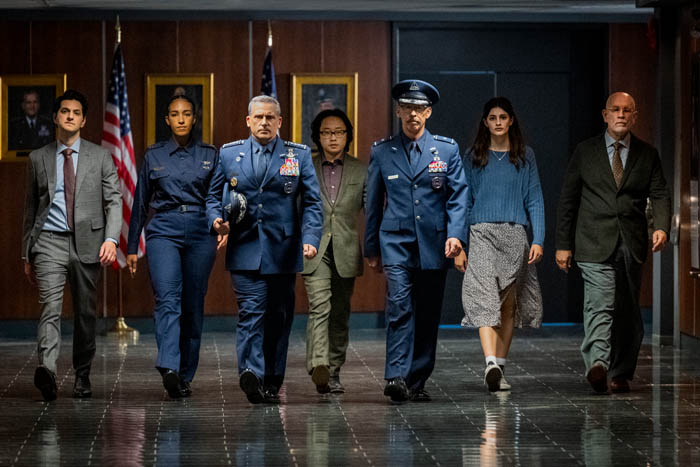 Space Force. (L to R) Ben Schwartz as F. Tony Scarapiducci, Tawny Newsome as Angela Ali, Steve Carell as General Mark Naird, Jimmy O. Yang as Dr. Chan Kaifang, Don Lake as Brad Gregory, Diana Silvers as Erin Naird, John Malkovich as Dr. Adrian Mallory in episode 201 of Space Force. Cr. Diyah Pera/Netflix © 2021