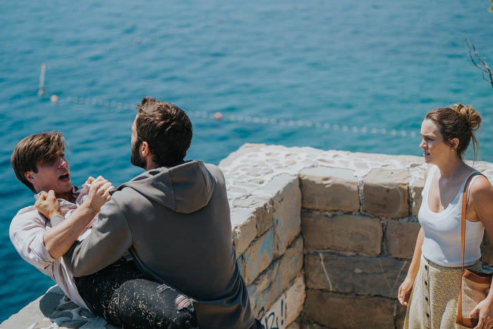 The Weekend Away. (L to R) Marko Braić as Luka, Ziad Bakri as Zain, Leighton Meester as Beth in The Weekend Away. Cr. Ivan Sardi/Netflix ©2022